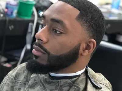 Taper fade with sculpted beard